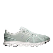 Pale green running sneaker on a white background 