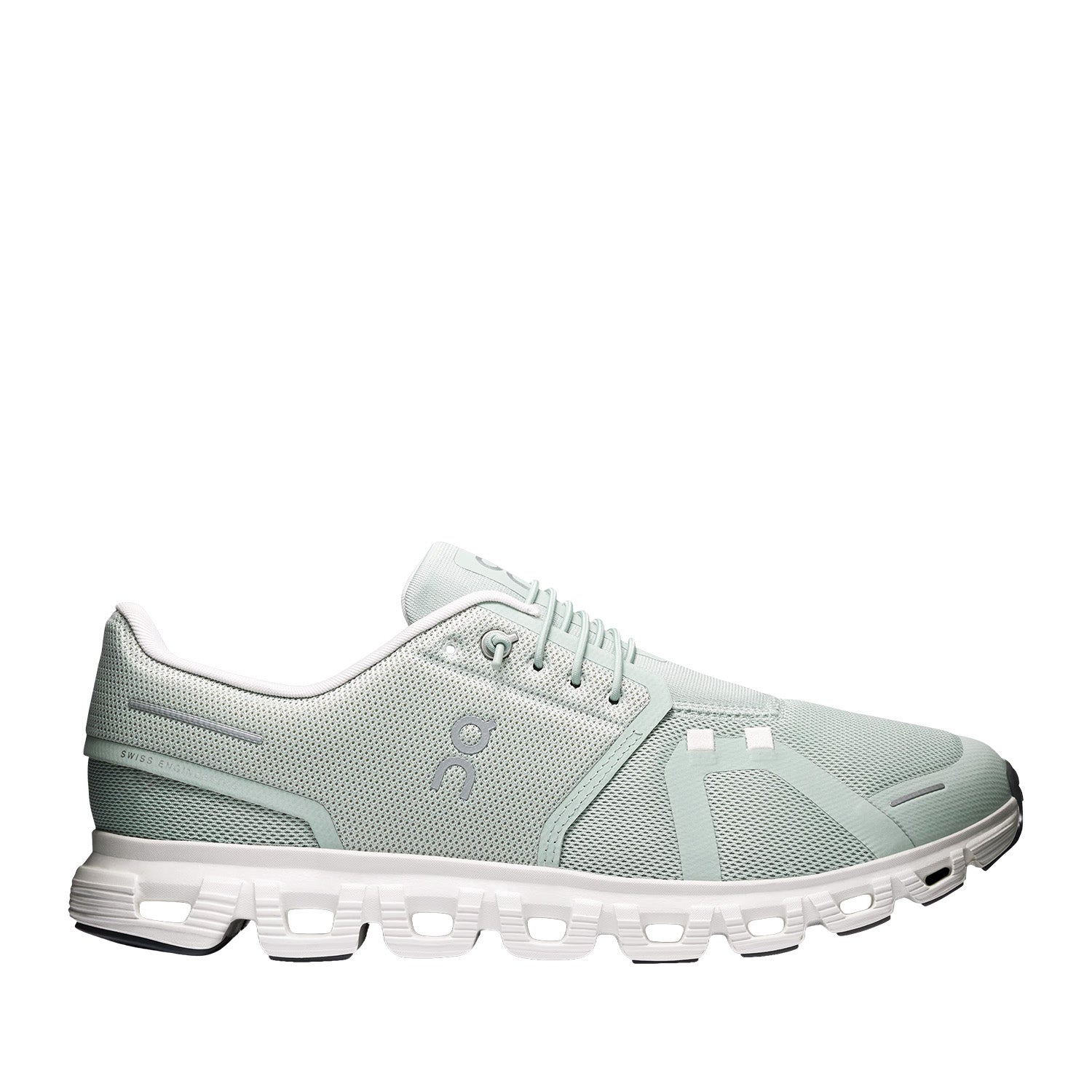 Pale green running sneaker on a white background 