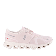 Pink running sneaker on a white background 
