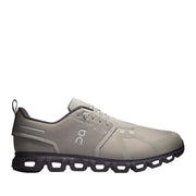Green brown running sneaker on a white background 