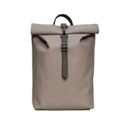 beige rolltop backpack on a white background