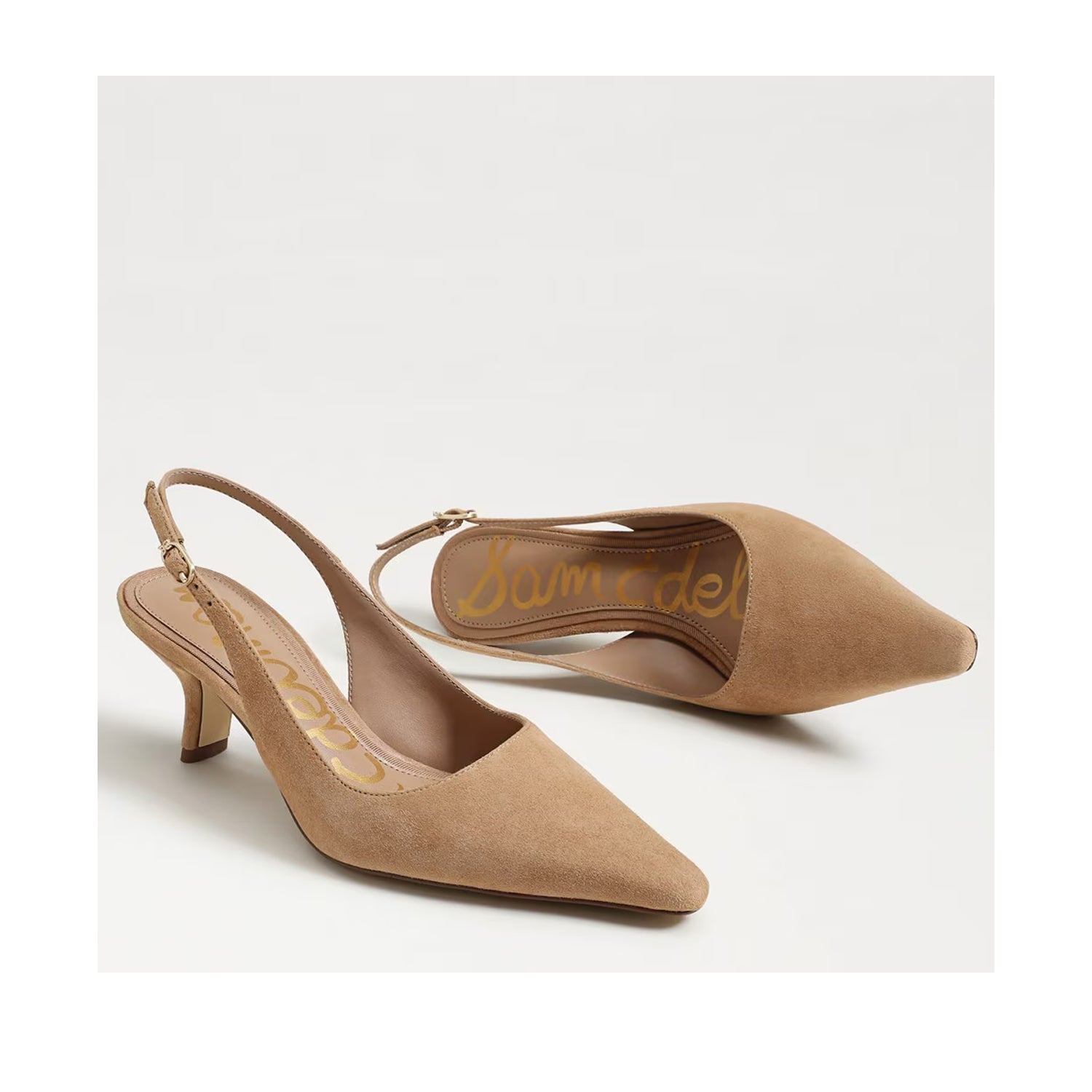 Tan suede slingback heel with a pointed toe