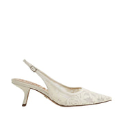 White lace high-heeled shoe on a white background