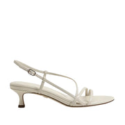 White slingback strappy kitten heel sandal on a white background.