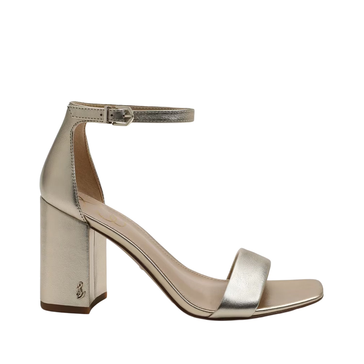 Gold high-heeled sandal on a white background