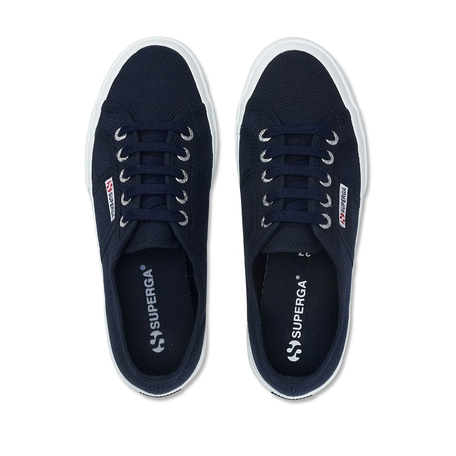 Navy lace-up sneaker with white sole on a white background
