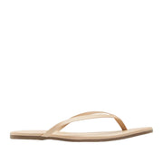 Cream leather flip flops on white background
