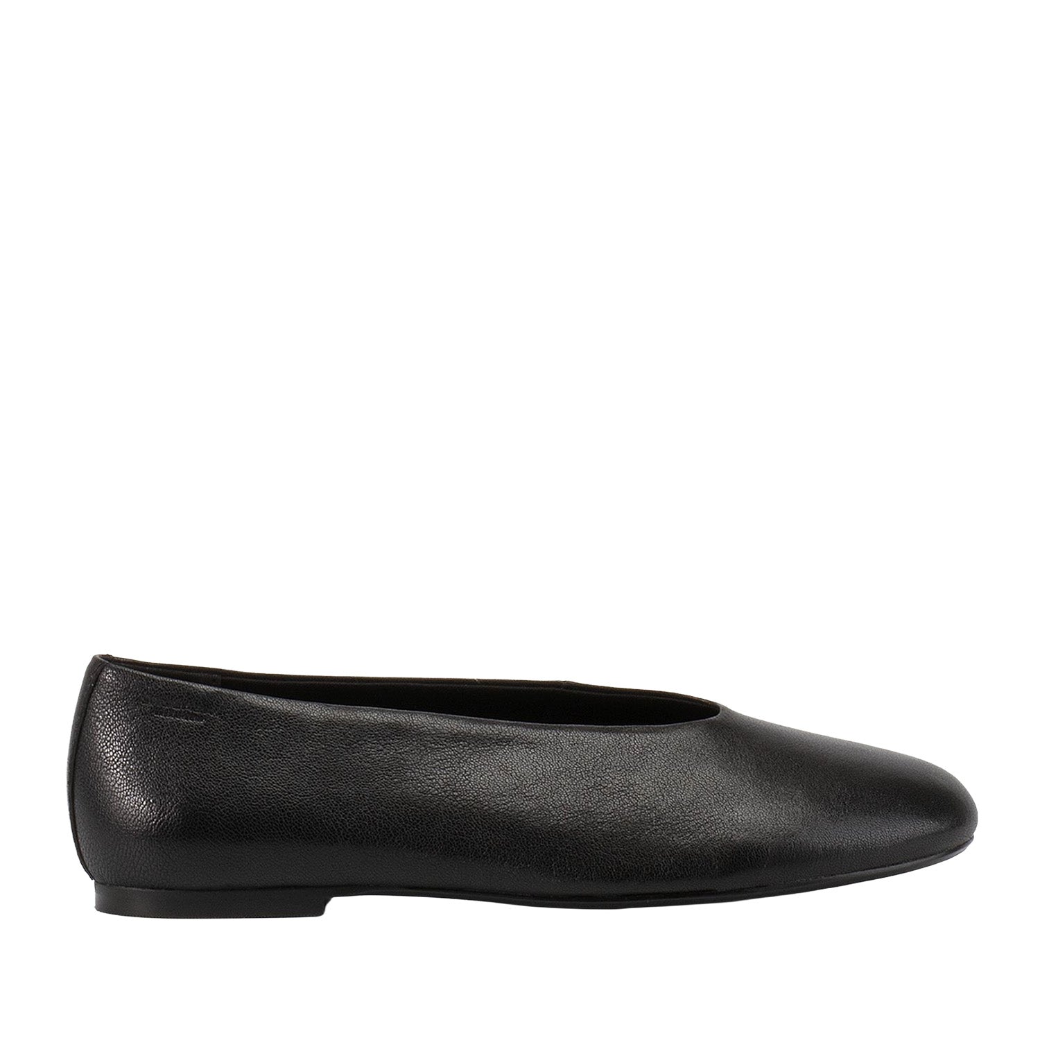 Black leather slip-on ballet flat on a white background