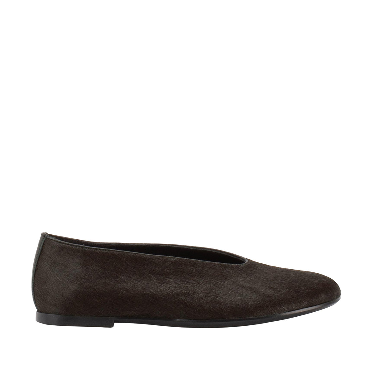 brown pony hair ballet flat on a white background