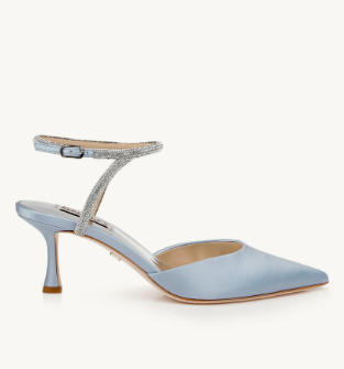 Blue heel with embellished ankle strap on grey background