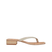 Beige sandal with a woven strap on a white background