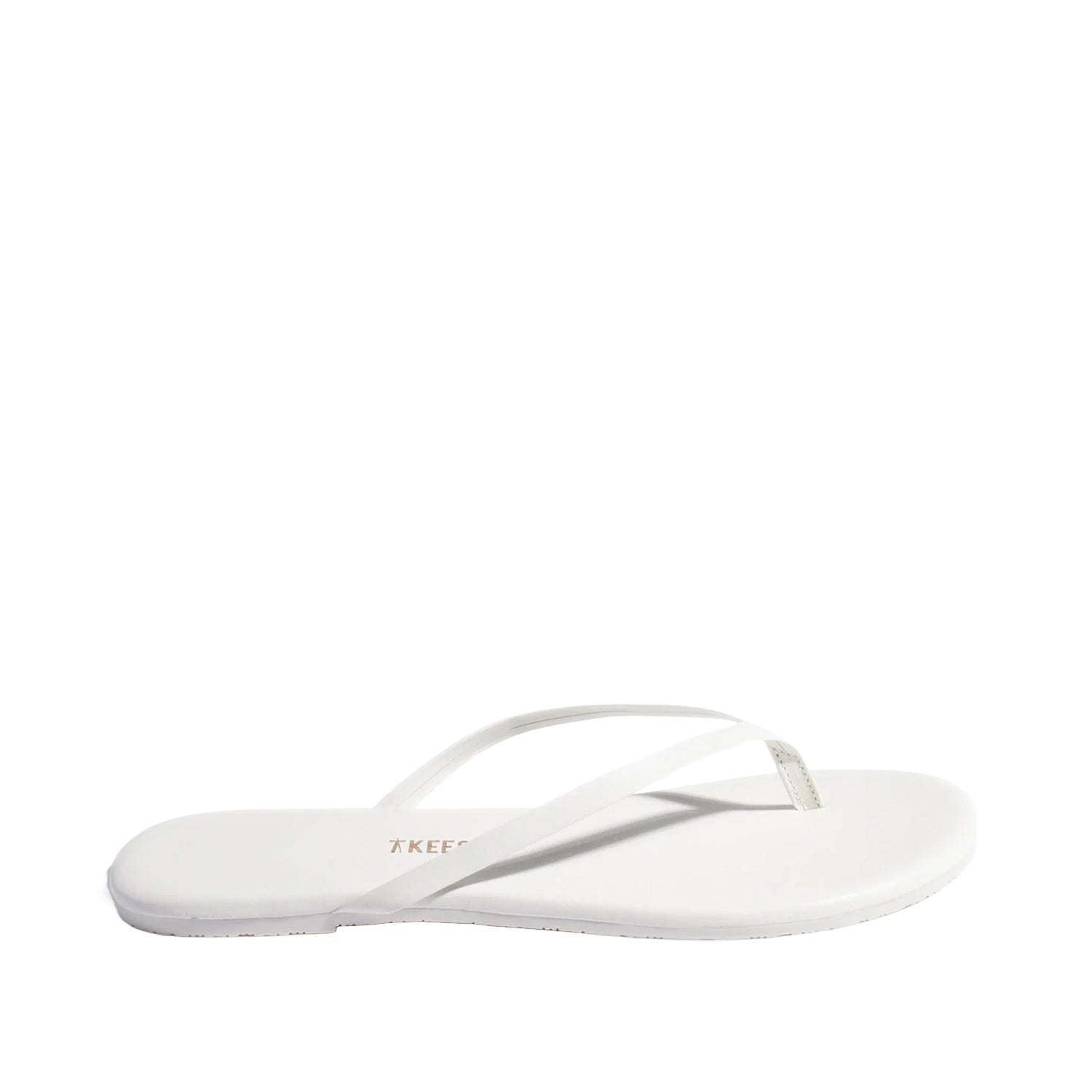 White leather flip flops on white background